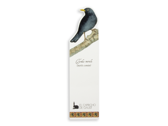 bookmark showing a cut-out blackbird and El Capricho de Gaudí's logo printed