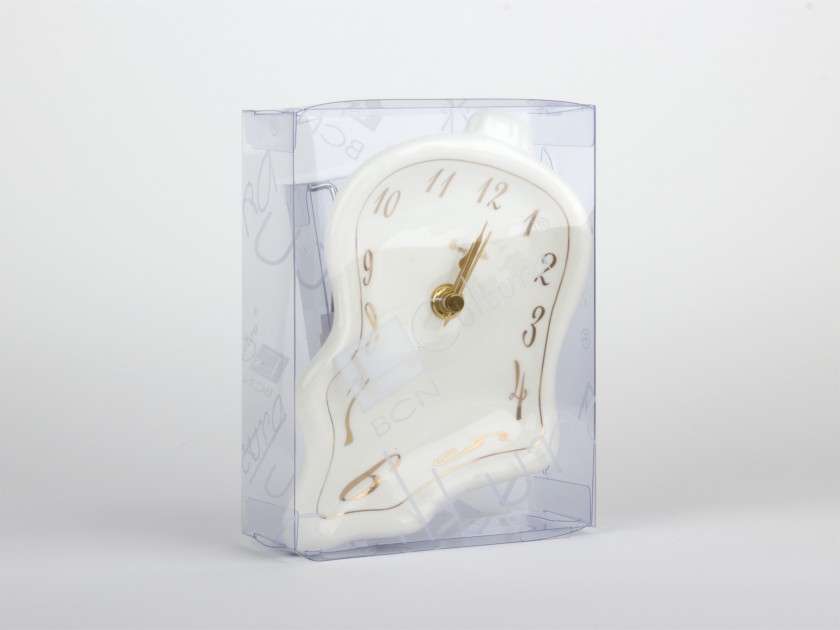 Horloge en céramique émaillée en blanc et or