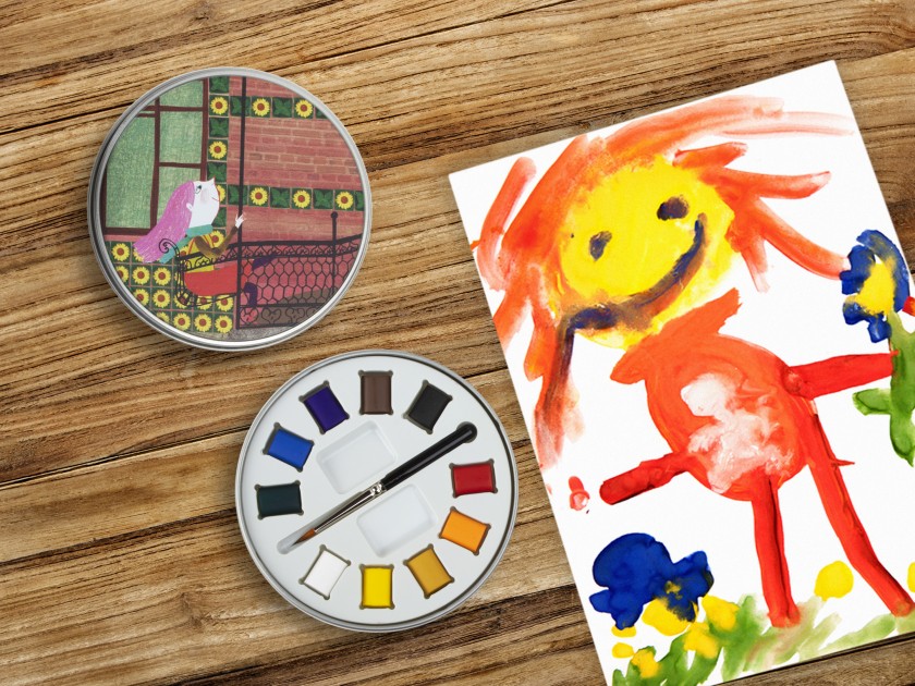 caja redonda de pintura para acuarela, con la tapa impresa con un dibujo infantil