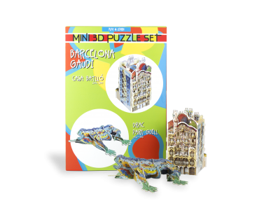 Assembled 3D puzzles of the Casa Batlló and the Dragon of Park Güell in front of the packaging