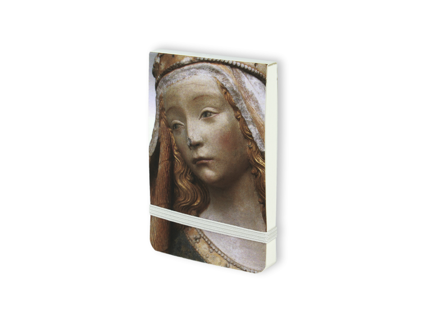 Quadern vist de front amb la cara de Notre Dame de Grasse impresa a la tapa