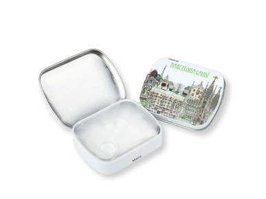 Two tin boxes of mints, one open, the other illustrated with Gaudí's monuments in Barcelona