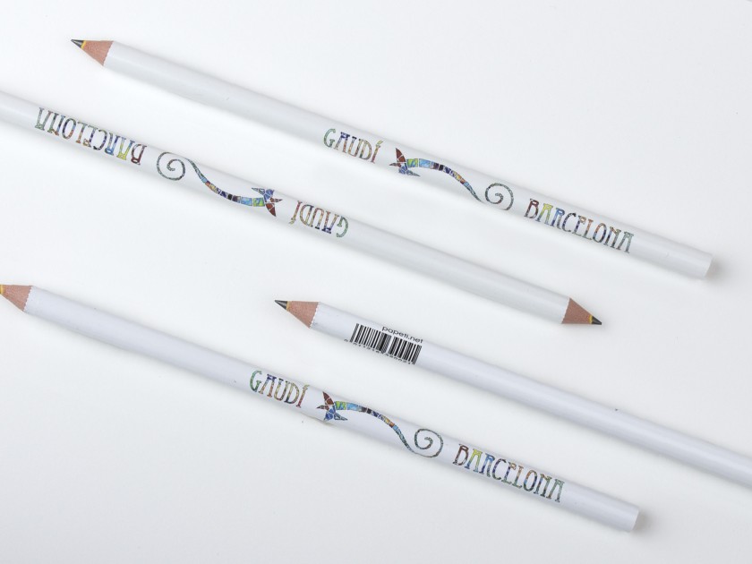 Two pencils illustrated with the name of the city of Barcelona in mosaic on a white background