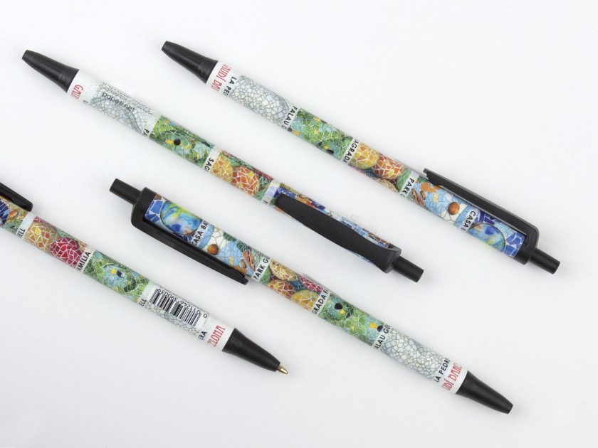 Two pens illustrated with the mosaics of Gaudí's monuments