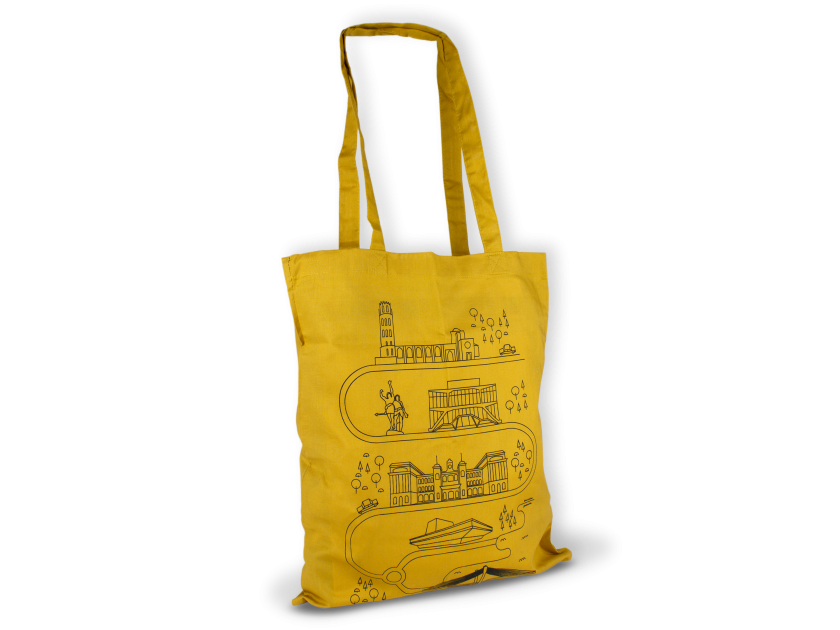 mustard coloured tote bag with several symbols of the city of Lleida printed on it
