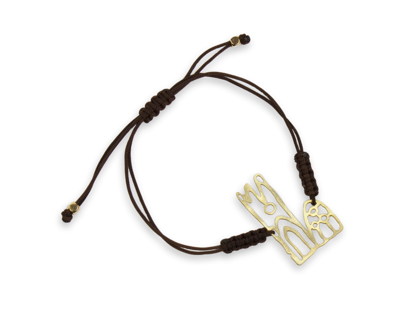 bracelet with a cord link and a representation of the cathedral of Lleida in gilded metal
