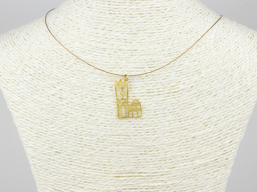 necklace with a golden metal pendant featuring Lleida Cathedral