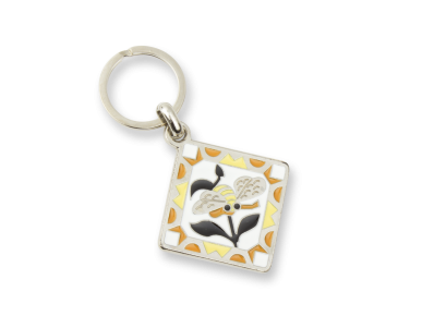 metal keyring showing a stained glass window