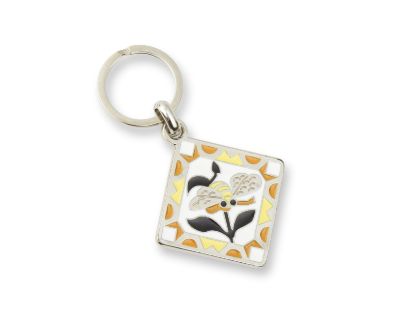 metal keyring showing a stained glass window
