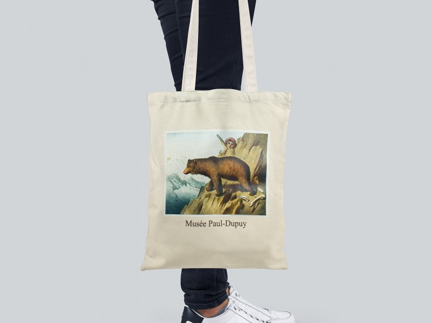 Natural cotton tote bag with a painting of a brown bear printed on it