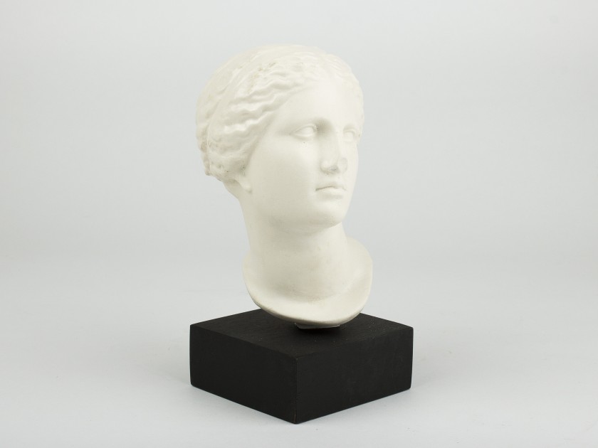 Head of a statue of Venus on a black base