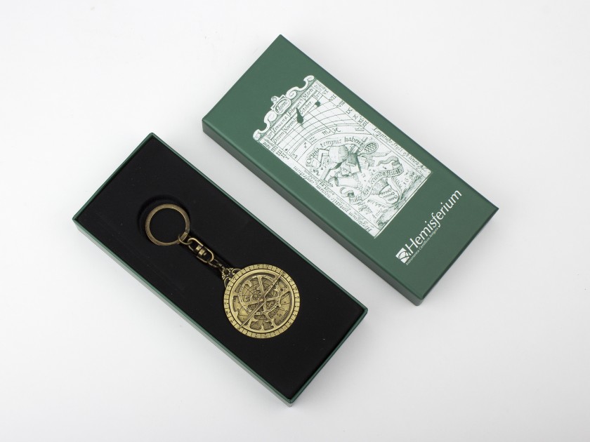 gilded metal keyring featuring a mini peripheral astrolabe