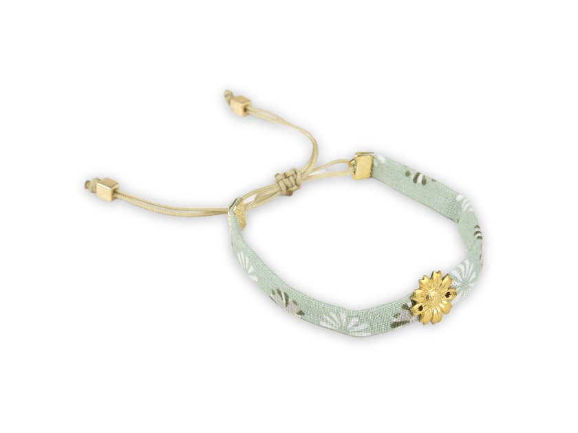turquoise fabric bracelet with a golden sunflower sewn in