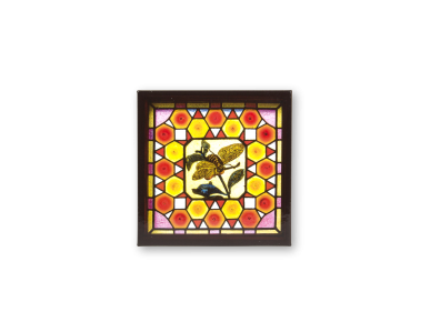 square magnet showing a picture of a stained glass window with a bee playing a guitar