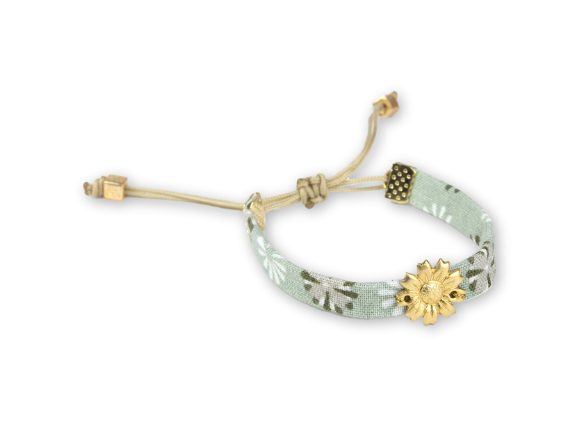 bracelet en tissu turquoise avec une fleur de tournesol dorée cousue dessus
