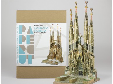 paper model of the Sagrada Família placed next to its packaging