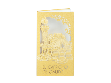 cuaderno con tapa dorada cortada a láser que muestra El Capricho de Gaudí