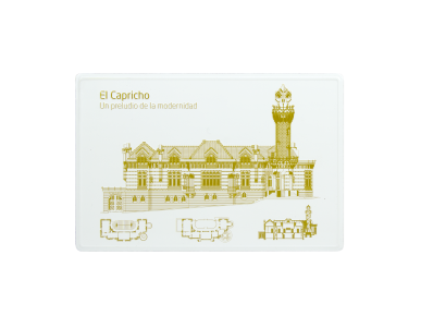 white magnet featuring gold drawings of El Capricho de Gaudí