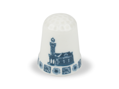 ceramic thimble with El Capricho de Gaudí printed on it