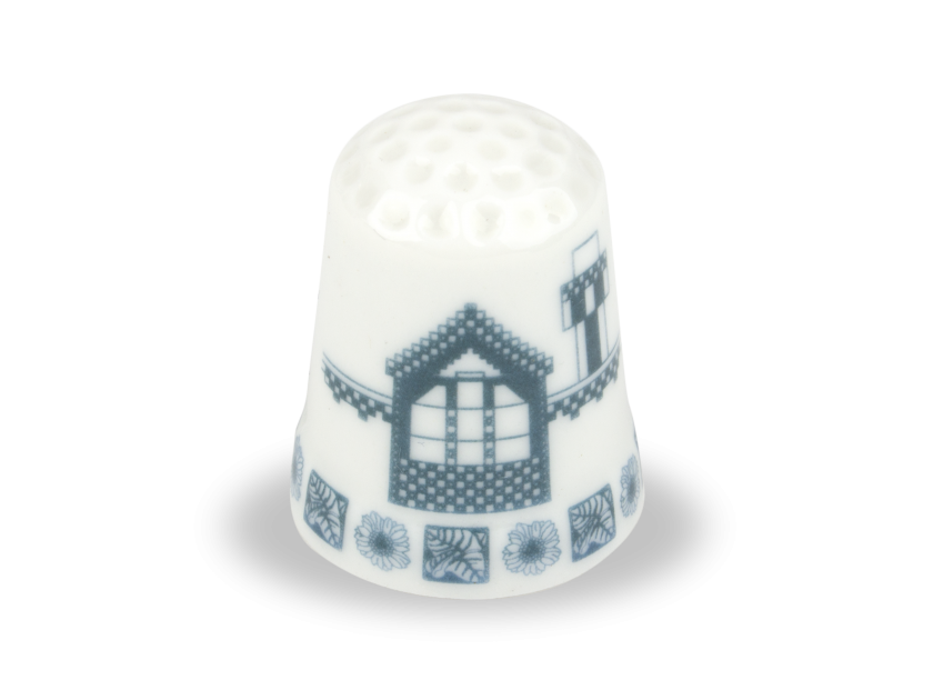 Dedal de cerámica con detalles del Capricho de Gaudí impresos