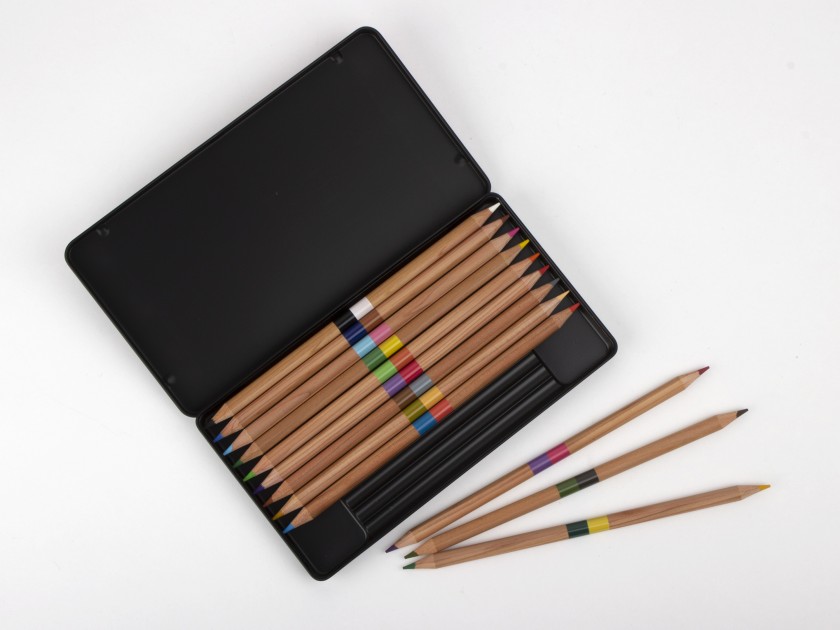 box of coloured pencils with the lid printed with flowers and sunflower leaves