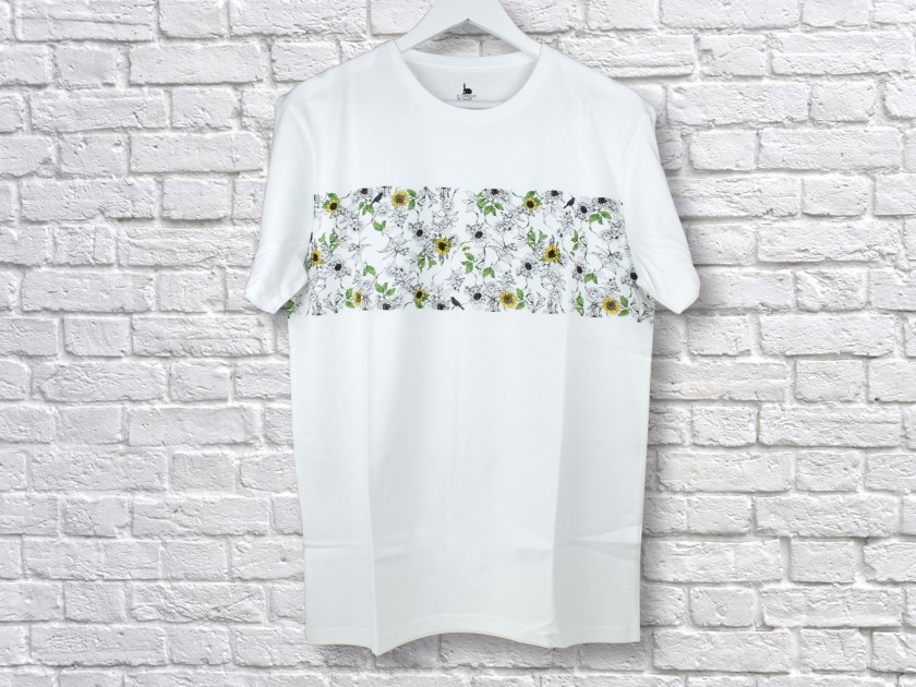 white t-shirt with a band of sunflowers printed on the chest