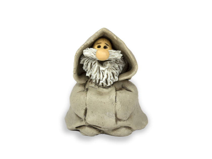 figurita de cerámica de un monje