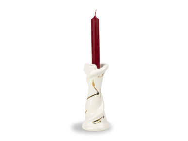 Candelabro de cerámica esmaltada en blanco y negro con una vela